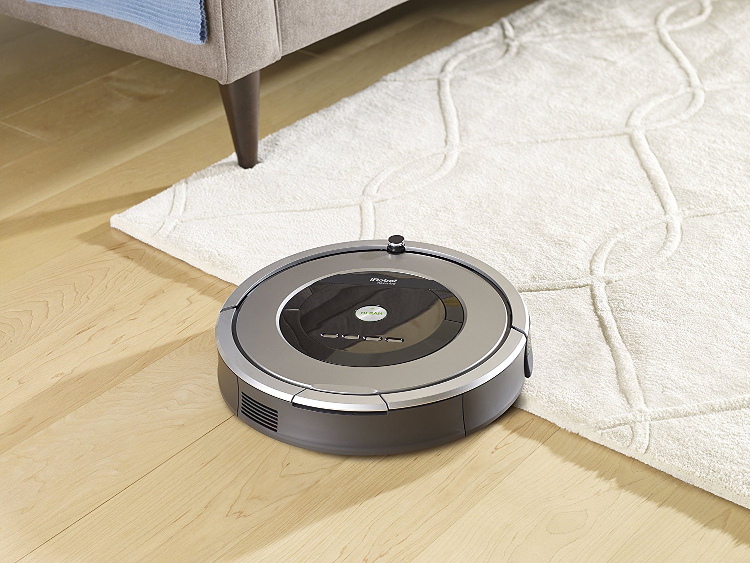 Robotic vacuum cleaner transition from floor to carpet